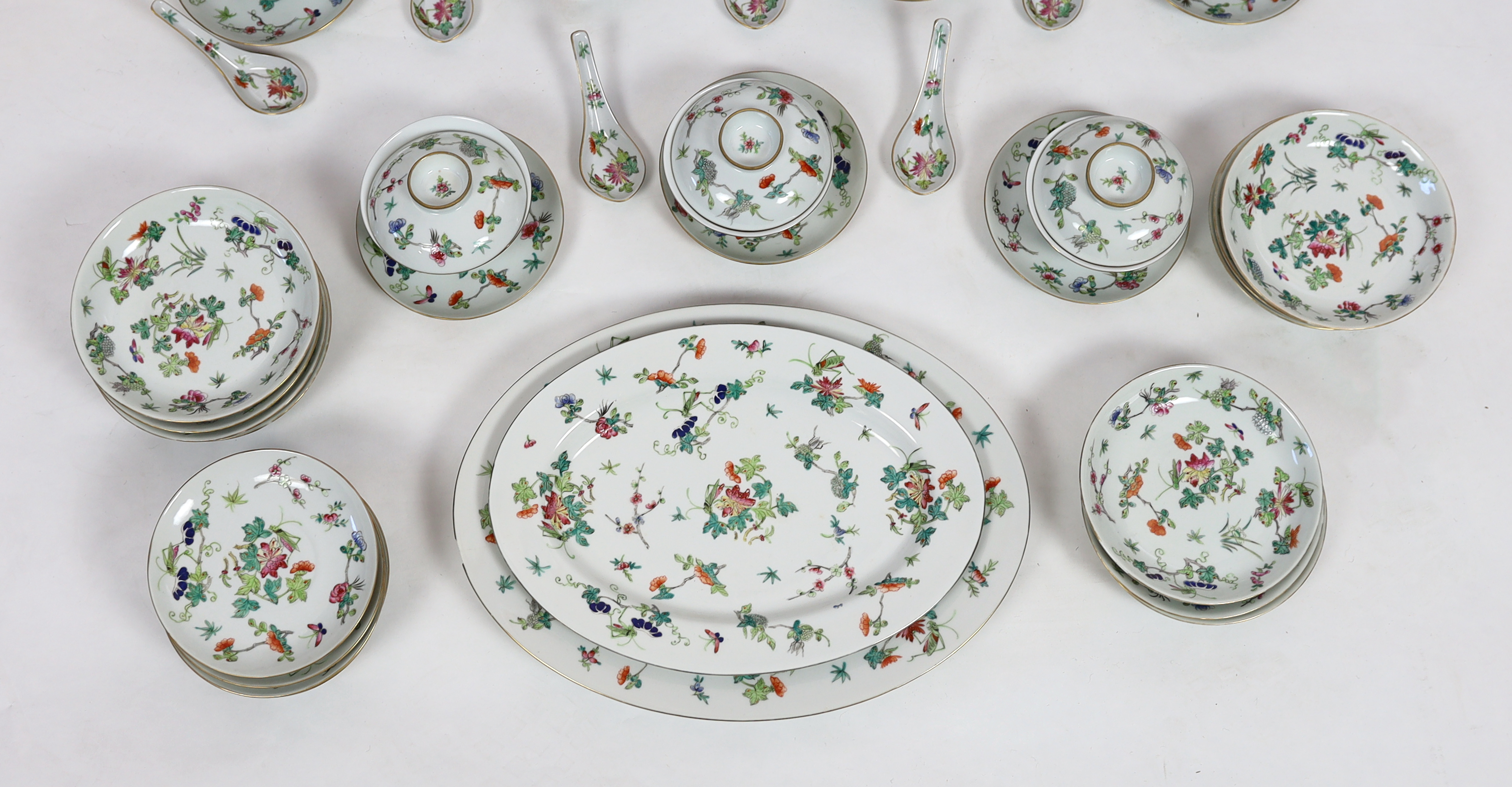 A large Chinese famille rose table service, late Qing/early Republic period